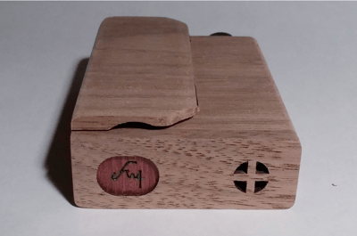 Bottom of recalled Firewood 4 vaporizer in unfinished walnut